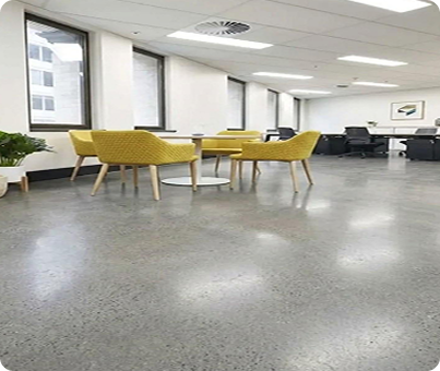 Polished-concrete-floor-in-a-modern-commercial-corridor-with-yellow-columns
